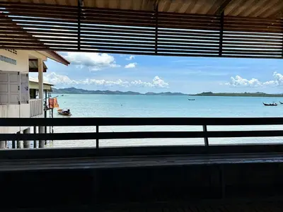 a view of the ocean from a building at Modern Sunset Sea House Lam Sai in Ko Yao Noi