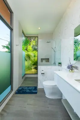 a bathroom with a tub and a toilet and a sink at Villa Mimosa 1, Luxury 4BR with Private Pool/Rawai in Phuket Town