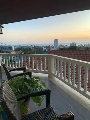 a balcony with a view of the city at Scan House Apartment in Karon Beach