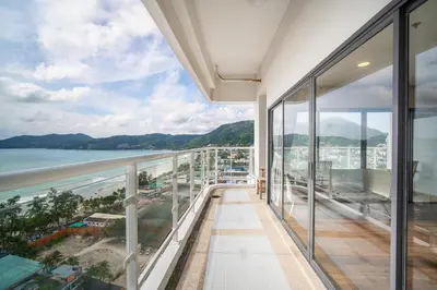 a view of the ocean from the balcony of a building at Patong Tower Superior Seaview 4BR-2101 in Patong Beach