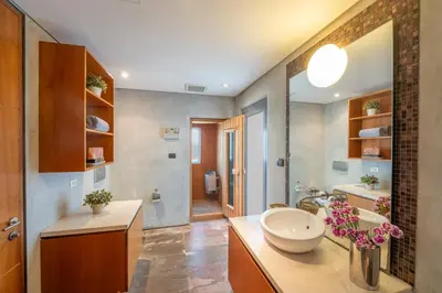 a bathroom with a sink and a mirror at Villa Hale Malia in Kathu