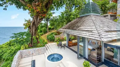 an ocean view of a house with a hot tub at Villa Rom Trai in Kathu