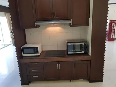 a kitchen with two microwaves on a counter at ViewPoint Villa in Kathu