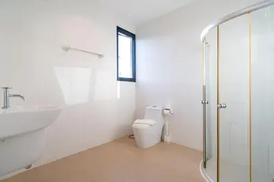 a bathroom with a toilet and a sink and a shower at Kamala Beach 3-bedroom villa near Fantasea with high-speed Wi-Fi and private pool in Kamala Beach