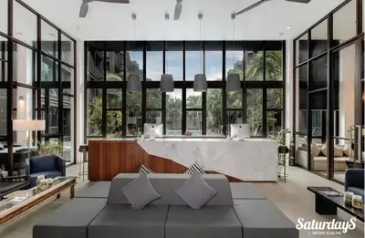 a large living room with a large tub in a building at Saturays condo One Bedroom Suite 178 in Ban Saiyuan (1)