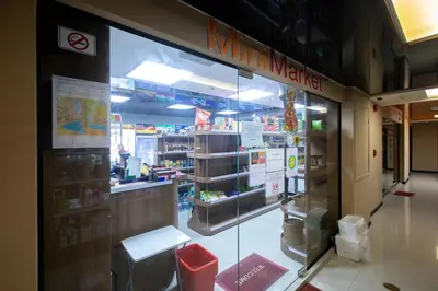 a store front of a store with a glass window at 1bdr Spacious Studio near NaiHarn Beach by Capital Pro in Phuket Town
