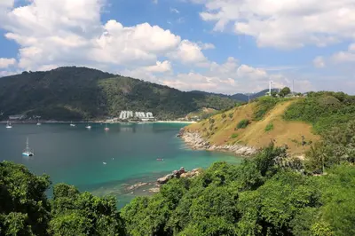 a view of a lake with boats in the water at 1bdr Apartment Relife Naiharn by Capital Pro in Phuket Town