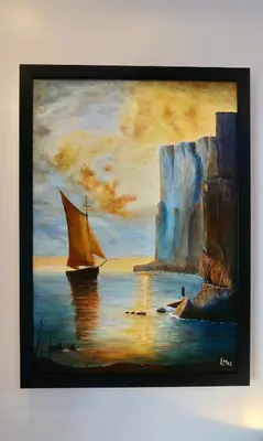 a painting of a sail boat in the water at Jasmine Village in Rawai Beach