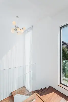 a glass room with a window and a chandelier at 2bdr pool villa in Rawai by Capital Pro SUM-20-144 in Phuket Town