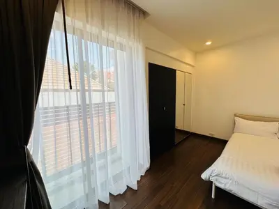 a bedroom with a bed and a large window at 2bdr pool villa in Rawai by Capital Pro SUM-20-144 in Phuket Town