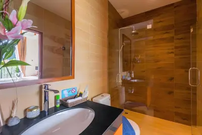 a bathroom with a sink and a shower at 3bdr VIP Villa Rawai with private pool in Phuket Town