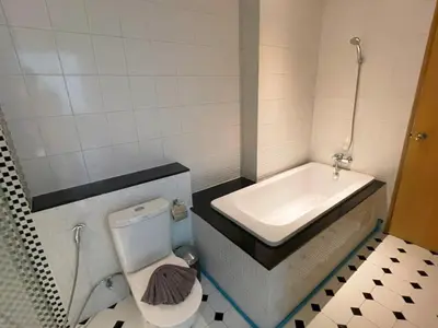 a small bathroom with a sink and a toilet at Spacious apartment Kamala Falls by Lofty in Kamala Beach