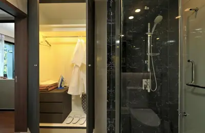 a bathroom with a shower with a glass door at Mountain view Apartment Surin Beach 716 by CapitalPro in Phuket Town