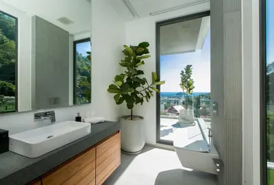 a bathroom with a sink and a large window at Villa Nordic Star Seaview Near Kata Beach in Kata Beach