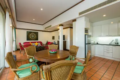 a kitchen and dining room with a table and chairs at Katamanda villa Sooksan Near Kata Noi Beach in Kata Beach