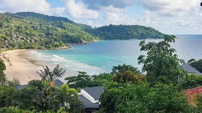 a view of a beach with trees and the ocean at Katamanda villa Sooksan Near Kata Noi Beach in Kata Beach