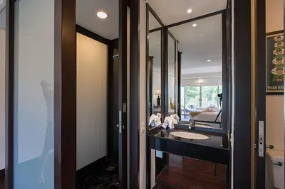 a bathroom with a sink and a mirror at Katamanda - Villa Katamalee Private Pool near Kata Noi Beach in Kata Beach