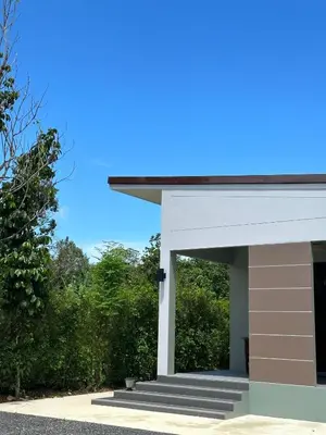 a rendering of a building with a blue sky at Liang's Home เหลียงโฮม in Ban Riang