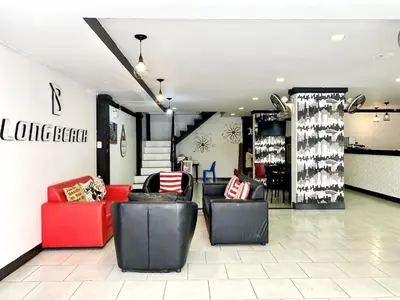 a store with couches and chairs in a room at Beachwalk Patong in Patong Beach