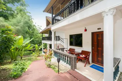 a view of the front porch of a house at Oceanview Bungalows by EAT in Karon Beach