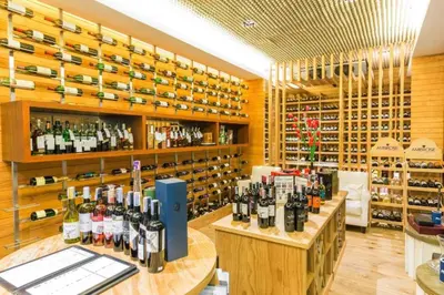a wine store with a lot of bottles of wine at Club Wyndham Sea Pearl Phuket in Patong Beach