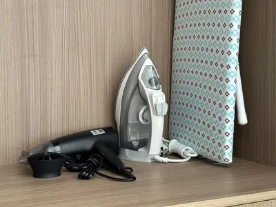 a hair dryer and a hair dryer on a shelf at Great Hill Jungle View Pool Gym Naiyang in Nai Yang Beach