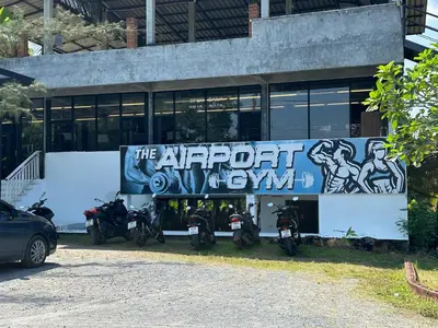 a group of motorcycles parked in front of a building at Great Hill Jungle View Pool Gym Naiyang in Nai Yang Beach