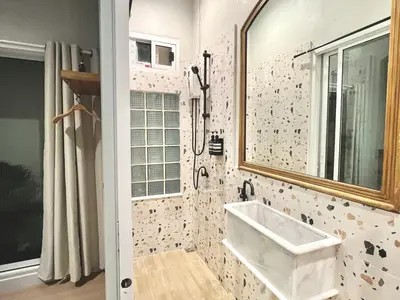 a bathroom with a sink and a mirror at Surfer House Patong Center 3 Bedrooms in Patong Beach