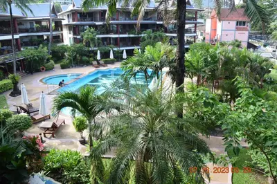 an overhead view of a swimming pool in a resort at KALIM RESIDENCE unit 132 VUE MER in Patong Beach