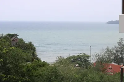 a view of the ocean from a house at Oceana Resort Kamala Ocean View 5th floor in Kamala Beach
