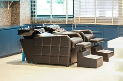 a row of reclining chairs in a waiting room at Kamala Beach P55 Exclusive Junior Suite in Kamala Beach