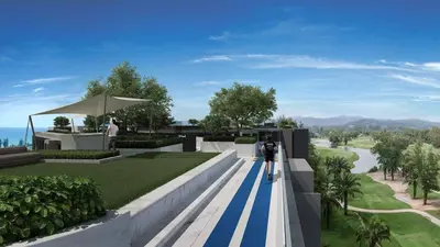 two people standing on a blue and white striped walkway at Sky Park Laguna 1 bedroom Golf View in Bang Tao Beach
