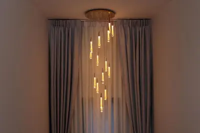 a chandelier is hanging from a ceiling at Modern villa with pool close to the beach - LP #97 in Phuket Town