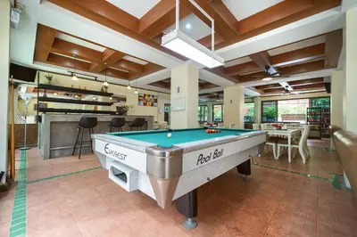 a billiard room with a pool table in it at Patong Central Residence & Apartment in Patong Beach