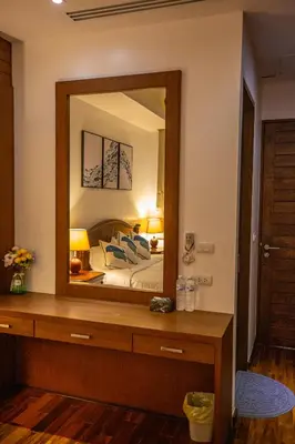 a bedroom with a large mirror and a bed at Phuket Boutique Pool Villa-79 in Rawai Beach
