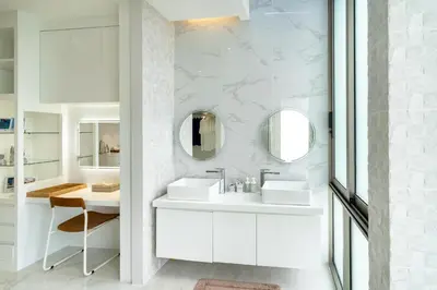 a white bathroom with a sink and mirror at Exquisite Pool Residence A19: Aesthetics and Luxury Combined in Bang Tao Beach