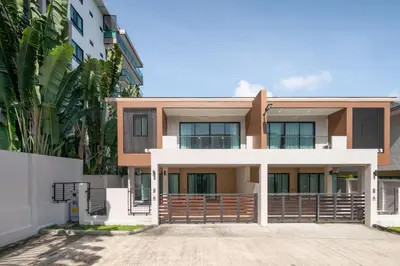 an image of a house from the driveway at Chao Wilai Residence I Naiyang Beach I HKT Airport in Nai Yang Beach