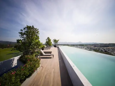 a swimming pool on the roof of a building at Skypark Laguna Rooftop Pool Apartment near Bang Tao Beach in Bang Tao Beach