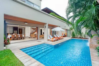 a swimming pool in the backyard of a villa at The Residence Villa 203 in Bang Tao Beach