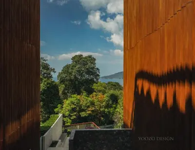a view from a building with a view of trees at Bluepoint SeaView Retreat Patong in Patong Beach