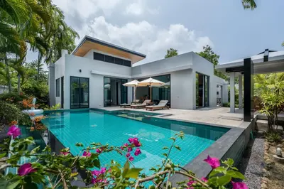 a swimming pool in the backyard of a house at Ban Bua Lux x MonthStayz Thailand in Rawai Beach