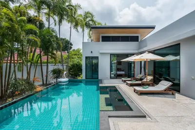a swimming pool in the backyard of a villa at Ban Bua Lux x MonthStayz Thailand in Rawai Beach