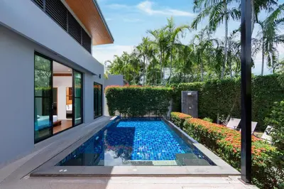 a swimming pool in the backyard of a house at Ban Bua Lux x MonthStayz Thailand in Rawai Beach