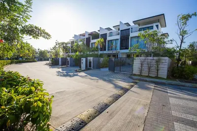 an empty street in front of a building at Phuket villa in Laguna Park in Bang Tao Beach