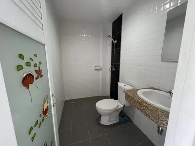 a bathroom with a toilet and a sink at Patong Easy Life 6 in Patong Beach
