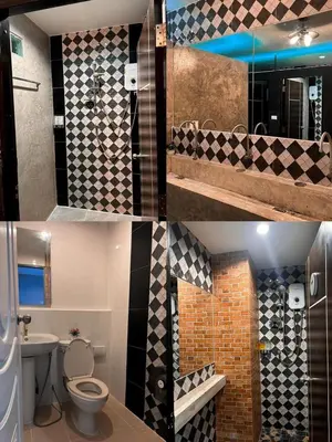 a bathroom with a toilet and a sink at Bell Lifestyle Hostel Phuket in Nai Yang Beach