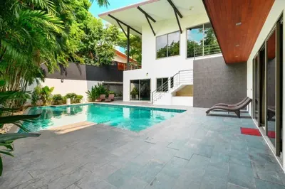 an image of a swimming pool in a house at Villa Pattara Rawai in Ban Saiyuan (1)