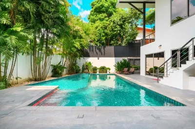 an image of a swimming pool in a house at Villa Pattara Rawai in Ban Saiyuan (1)