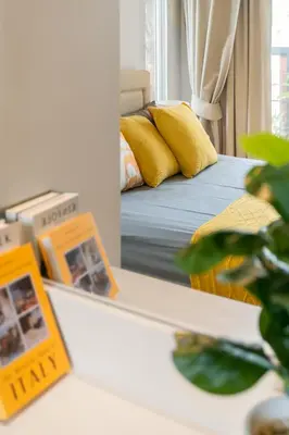 a bedroom with a bed and a mirror in a room at Kamala Garden View Villa 3 Bdr in Kamala Beach