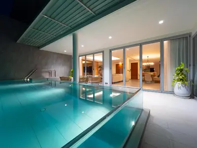a swimming pool in a house at ANGSANA Beachfront Residences apartment with pool in Laguna Phuket in Bang Tao Beach